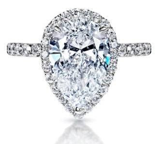 Pear cut ring surrounded with stones خاتم دمعه محاطة بأحجار - just like diamonds